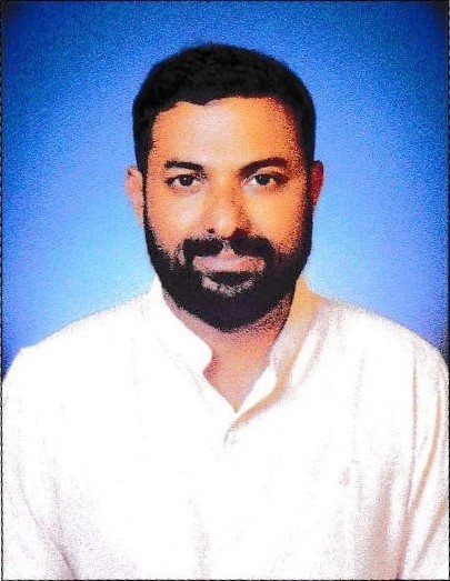 कर्मचाऱ्याचा फोटो